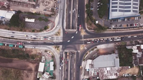 Aerial View of Busy Urban Intersection with Underpass and Traffic Flow Stockbeeldmateriaal 341421063