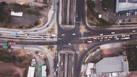 Aerial View of Busy Urban Intersection with Underpass and Traffic Flow Stockbeeldmateriaal 341421436