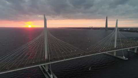 Aerial view cable bridge traffic on the sunset in Saint-Petersburg, Russia Stock Footage 127533434