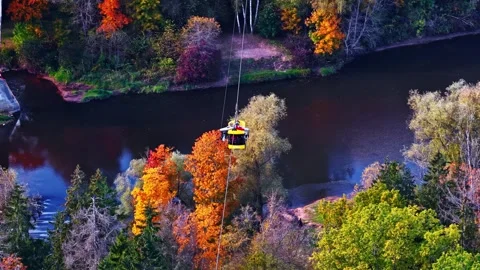 Aerial view of cable car over Gauja river in Sigulda, Latvia. Stock Footage 345006068