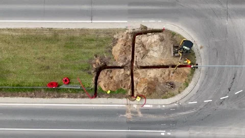 Aerial View of cable laying Construction Site with Trenches Stock Footage 296957847