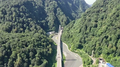 Aerial view of cable-stayed bridge and a new highway from Sochi to Krasnaya Vidéo 150140582