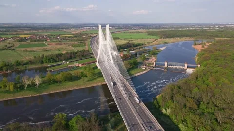 Aerial view of cable stayed bridge with cars over Odra river in Wroclaw, Poland Stock Footage 223339979