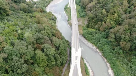 Aerial view of cable-stayed bridge on the road to Krasnaya Polyana Stock Footage 321379923