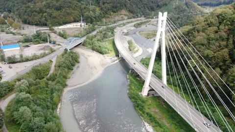 Aerial view of cable-stayed bridge on the road to Krasnaya Polyana Stock Footage 321379967