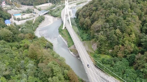 Aerial view of cable-stayed bridge on the road to Krasnaya Polyana Stock Footage 321379983