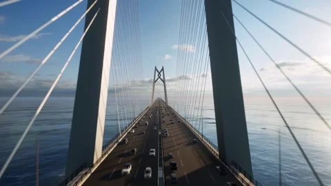 Aerial View of Cable Stayed Bridge Over Ocean with Traffic Flowing Vídeos de archivo 339072655