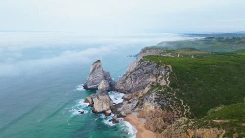 Aerial view of Cabo da Roca cliffs and sea stacks on the Atlantic coast Video stock 321978337