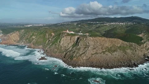 Aerial view of Cabo da Roca lighthouse on cliffs, Portugal. Stock Footage 344993031
