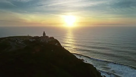 Aerial view of Cabo da Roca lighthouse at sunset, Portugal. Stock Footage 344993071