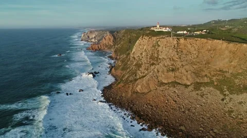 Aerial view of Cabo da Roca lighthouse on cliffs, Portugal. Stock Footage 344993170