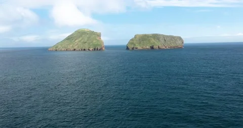 Aerial View Of Cabras Islets In The Middle Of Blue Sea In Daytime In 動画素材 234528570