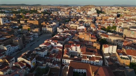 Aerial view of Caceres main square medieval towers and old town at sunrise Stock-Footage 342320836