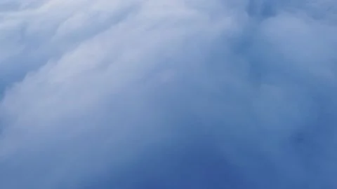 Aerial view of calm clouds floating over the Czech land coloured pink-orange fro Stock Footage 227184232