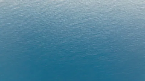 Aerial view of calm ocean surface for vacation setting Stock Footage 264425268
