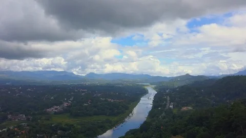 Aerial view of calm river in ceylon hill valley at sunny day drone footage Stock Footage 85532876