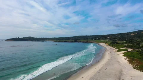 Aerial view of calm waves at the Carmel by the sea in sunny Monterey, CA, Stock Footage 255209706