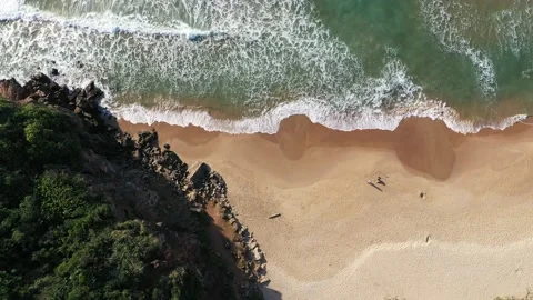 Aerial view of calm waves at the corner of bat at brava beach, Itajaí, Brazil Stock Footage 158573982