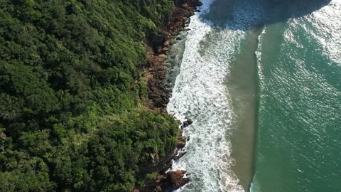 Aerial view of calm waves at the corner of bat at brava beach, Itajaí, Brazil Stock Footage 158574004