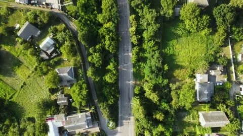 Aerial view (camera down) of Village Roads , Valley near to Hills, Lakes, Fields Stock Footage 162621516