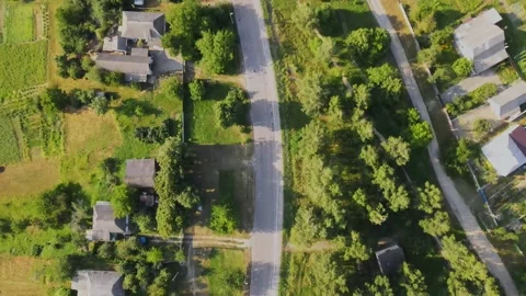 Aerial view (camera down) of Village with Roads in Valley near to Hills, Lakes Stock Footage 163094073