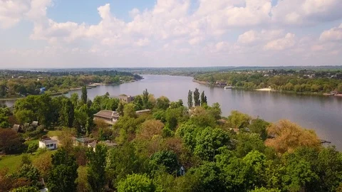 Aerial view the camera moves forward flying over the village Stock Footage 116763816