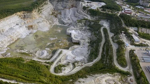 Aerial view, camera tracking conveyor belt that transporting rocks and soil Stock Footage 113551024