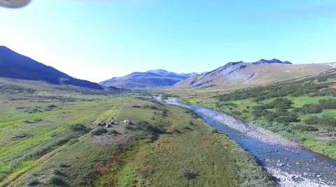 Aerial view of the camp in the plains Stock Footage 68985428