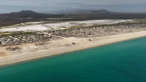 Aerial view of a camper van parked on the beach at Punta Arena in La Ventana. Stock Footage 345373958