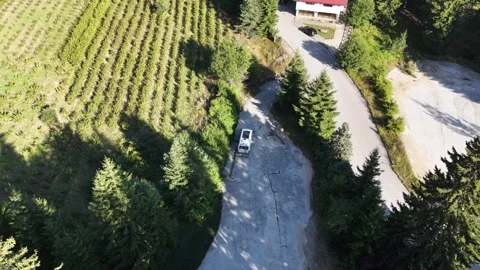 Aerial View of Camper Van Starting Journey and Turning on Mountain Road Video stock 343927761
