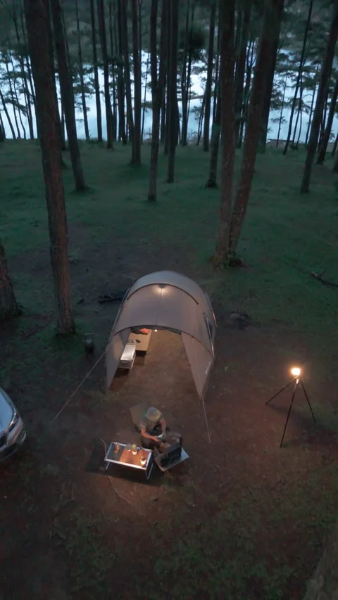 Aerial view, camping alone in the pine forest with SUV car Video stock 289311729