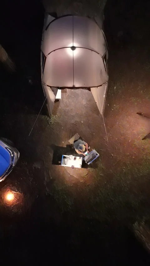 Aerial view, camping alone in the pine forest with SUV car Stock Footage 289319180