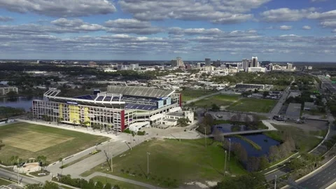 Aerial View of Camping World Stadium with Downtown Orlando Skyline Stock Footage 311281141