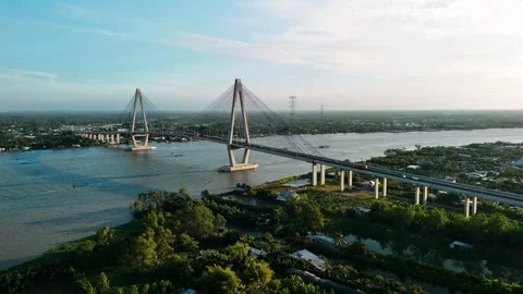 Aerial view of can tho bridge crossing the hau river at sunset, showcasing .. Stock-Footage 335017190
