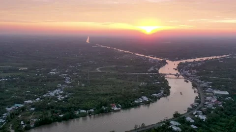 Aerial view of the Can Tho river during a brilliant sunset Stock Footage 167264182