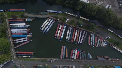 Aerial view of canal narrowboats through mist and fog clouds 動画素材 127822853