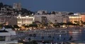 Aerial View of Cannes City Skyline People Walk and Relax on Beach Promenade Dusk 4k or 4k+ Resolution