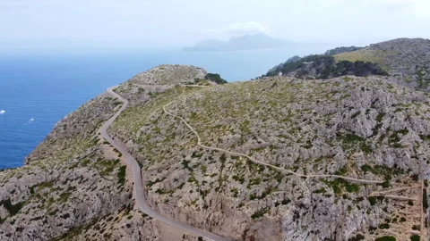 Aerial View of Cap Formentor with Winding Road Stock Footage 280342958