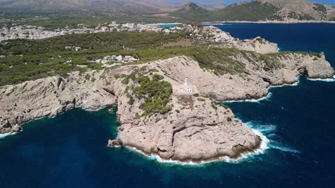 Aerial view of Capdepera lighthouse on mediterranean rocky coast, Mallorca Stock Footage 284875664
