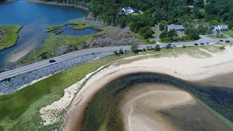 Aerial View of Cape Cod Road Following a Car. 4K Stock Footage 94748677