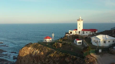 Aerial View of the Cape St Blaize Lighthouse into Overhead View of the Ocean Stock Footage 124418568