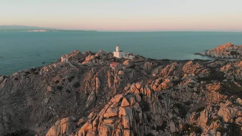 Aerial view of capo testa lighthouse wild granite coast in sardinia Stock Footage 115863307