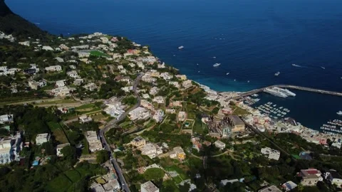 Aerial view of Capri harbor and coastal town, Italy. Stock Footage 345395827