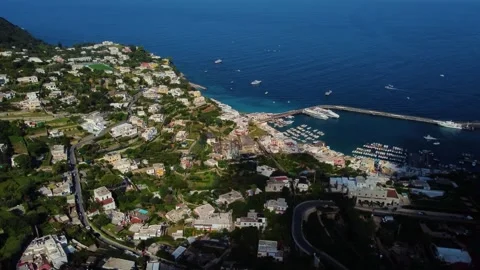 Aerial view of Capri harbor and coastline, Italy. Stock Footage 345395835