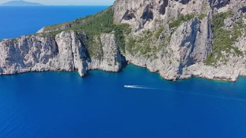 Aerial View Capri Island Vertical Sea Cliffs Motorboat Tyrrhenian Sea Stock Footage 337818328