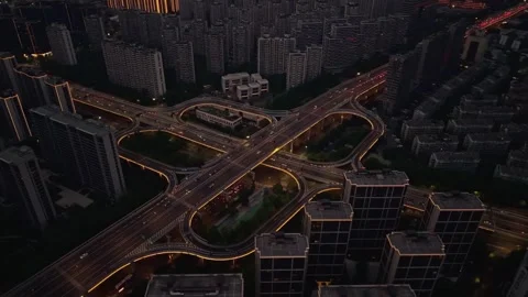 Aerial view captures bustling highway interchange illuminated at night Stockbeeldmateriaal 333775797