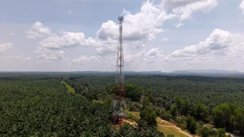 An aerial view captures a communication tower Stock-Footage 332596026