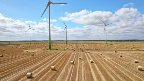 This aerial view captures the elegant rotation of wind turbines in a Lincol.. Stock Footage 252656857