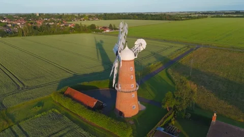 Aerial view captures historic windmill at sunrise 库存影片 342612678