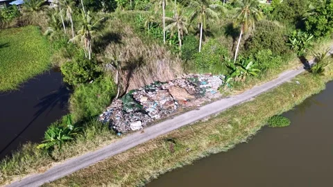 Aerial view captures a large pile of trash Stock Footage 339841704